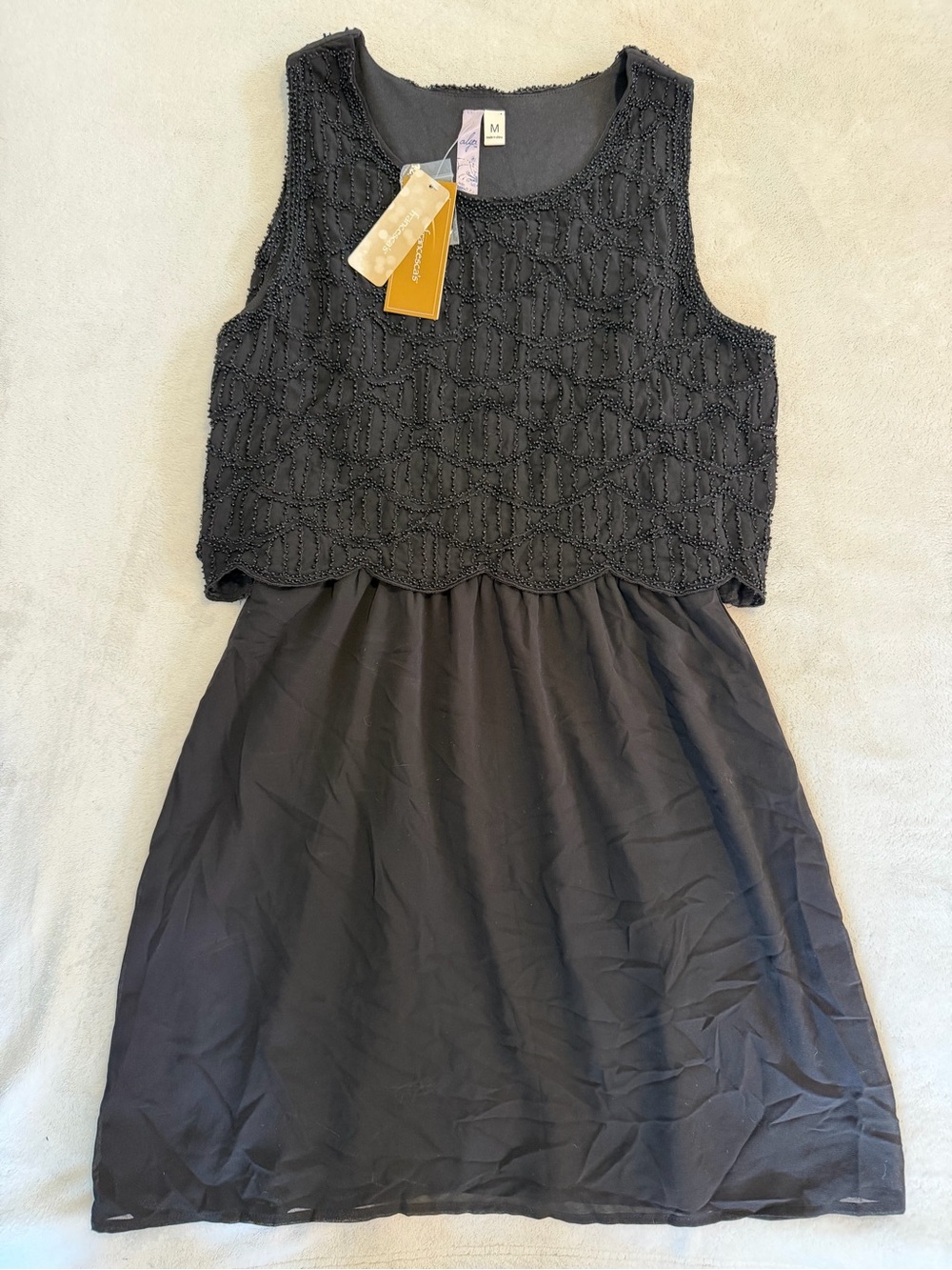 Francesca's Collections Black Sleeveless Beaded Mini Dress